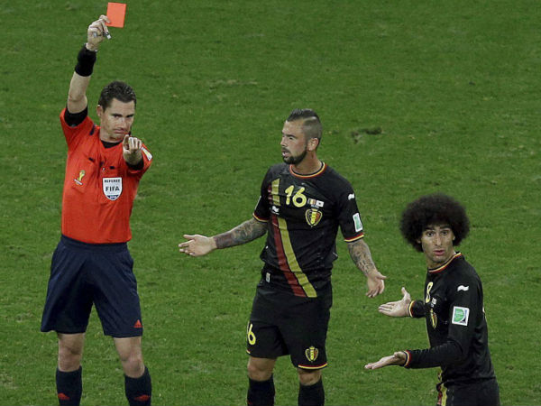 A referee (left) shows red card to a player during a football game. Sending off could soon be a reality in cricket A referee (left) shows red card to a player during a football game. Sending off could soon be a reality in cricket