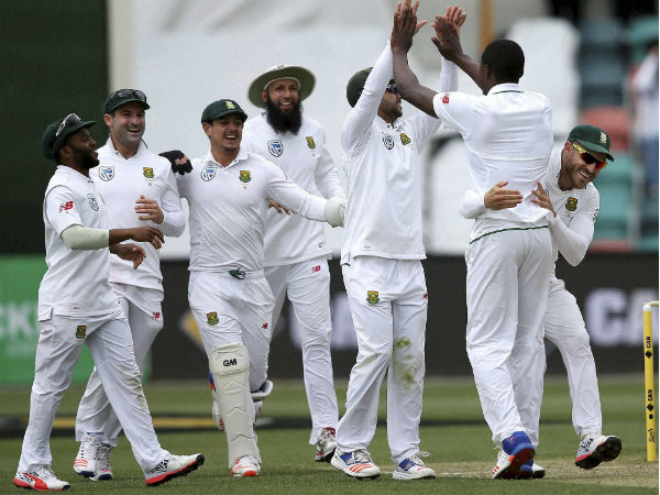 South African teammates celebrate with South Africa's Kagiso Rabada South African teammates celebrate with South Africa's Kagiso Rabada