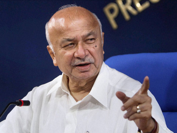 Sushilkumar Shinde, 130 Cong workers detained by Ahmedabad police Sushilkumar Shinde, 130 Cong workers detained by Ahmedabad police