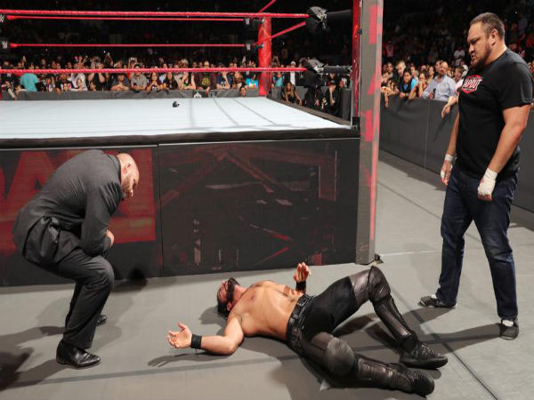 Triple H (left), Samoa Joe (right) attacked Seth Rollins (down) (Image courtesy: wwe.com) Triple H (left), Samoa Joe (right) attacked Seth Rollins (down) (Image courtesy: wwe.com)
