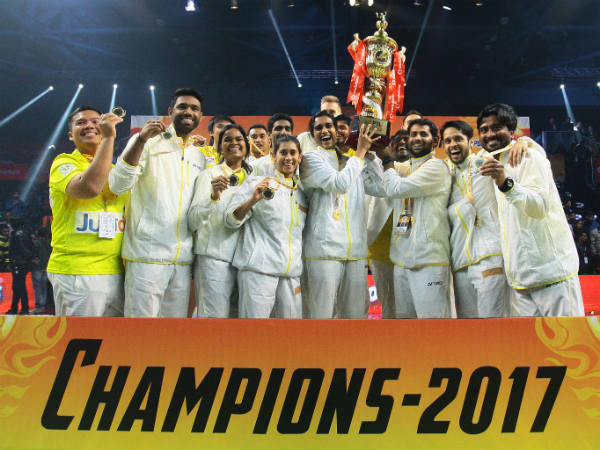 Chennai Smashers' players celebrate with the trophy Chennai Smashers' players celebrate with the trophy