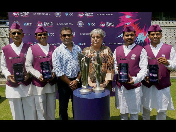 Mumbai Dabbawalas along with former Indian cricketers Sameer Dighe and Diana Edulji pose for a photo during a promotional event ahead of the ICC WT20 in Mumbai. Mumbai Dabbawalas along with former Indian cricketers Sameer Dighe and Diana Edulji pose for a photo during a promotional event ahead of the ICC WT20 in Mumbai.