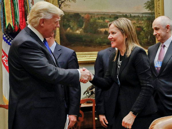 President Donald Trump greets GM CEO Mary Barra as he hosts a breakfast with automobile leaders in the Roosevelt Room of the White House in Washington. President Donald Trump greets GM CEO Mary Barra as he hosts a breakfast with automobile leaders in the Roosevelt Room of the White House in Washington.