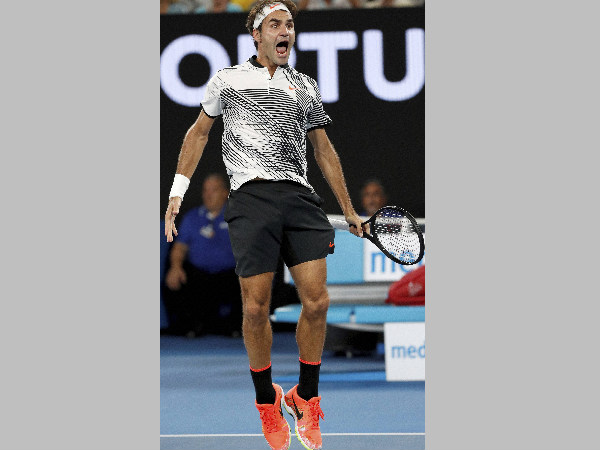 Roger Federer jumps up to celebrate his win over Kei Nishikori Roger Federer jumps up to celebrate his win over Kei Nishikori