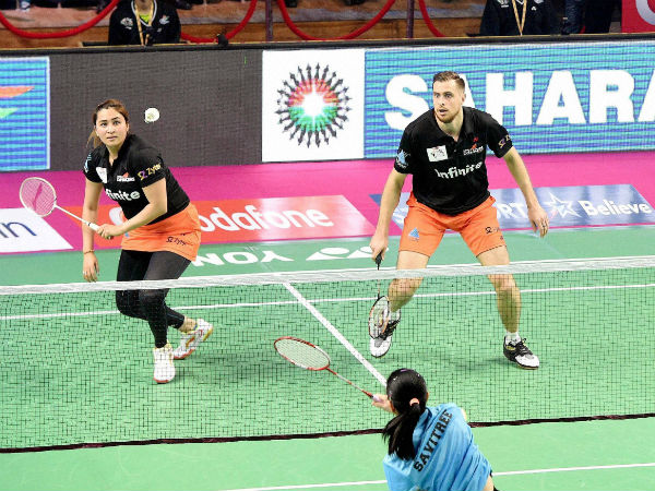 Jwala Gutta and Vladimir Ivanov of Delhi Acers in action against Awadhe Warriors during the Premier Badminton League match at Babu Banarsi Das Badminton stadium in Lucknow on Thursday. Jwala Gutta and Vladimir Ivanov of Delhi Acers in action against Awadhe Warriors during the Premier Badminton League match at Babu Banarsi Das Badminton stadium in Lucknow on Thursday.
