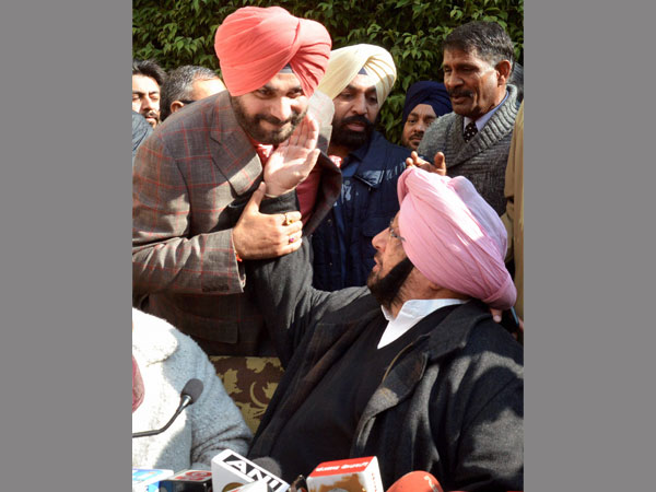 Punjab Pradesh Congress Committee (PPCC) President Captain Amarinder Singh and party candidate Navjot Singh Sidhu during a press conference in Amritsar. Punjab Pradesh Congress Committee (PPCC) President Captain Amarinder Singh and party candidate Navjot Singh Sidhu during a press conference in Amritsar.