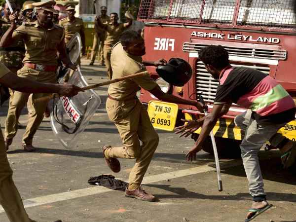 Pro-Jallikattu protesters during a violent clash with the police near Marina Beach in Chennai. Pro-Jallikattu protesters during a violent clash with the police near Marina Beach in Chennai.