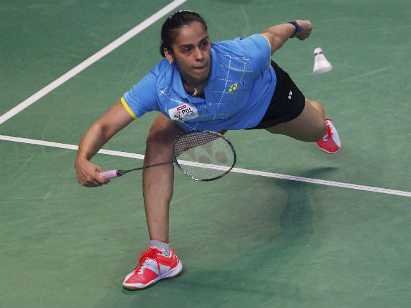 Saina Nehwal of Awadhe Warriors plays against Hong Kong's Cheung Ngan Yi of Bengaluru Blasters during the women's singles of Premier Badminton League (PBL) in Bengaluru on Monday. Nehwal won the match 9-11, 11-5, 11-3. Saina Nehwal of Awadhe Warriors plays against Hong Kong's Cheung Ngan Yi of Bengaluru Blasters during the women's singles of Premier Badminton League (PBL) in Bengaluru on Monday. Nehwal won the match 9-11, 11-5, 11-3.