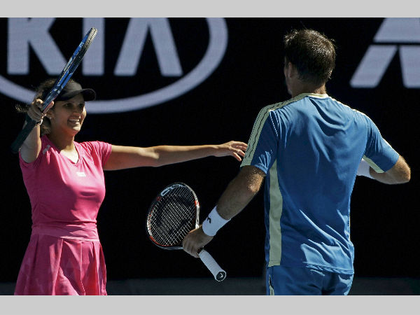 Sania Mirza (left) celebrates with Ivan Dodig after their semi-final win Sania Mirza (left) celebrates with Ivan Dodig after their semi-final win