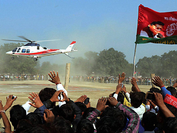 Uttar Pradesh Chief Minister and Samajwadi Party President Akhilesh Yadav arrives for an election rally in an helicopter in Sultanpur. Uttar Pradesh Chief Minister and Samajwadi Party President Akhilesh Yadav arrives for an election rally in an helicopter in Sultanpur.
