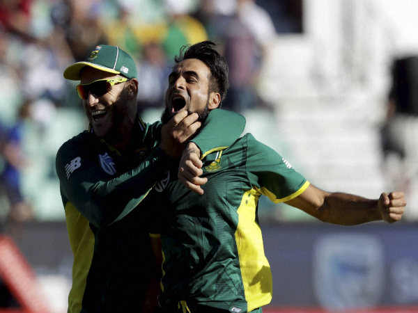 Imran Tahir (Right) celebrates with captain Faf du Plessis Imran Tahir (Right) celebrates with captain Faf du Plessis
