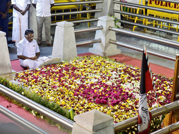 Tamil Nadu Chief Minister O Panneerselvam sitting in a meditation in front of late J Jayalalithaa's burial site at the Marina Beach in Chennai. Tamil Nadu Chief Minister O Panneerselvam sitting in a meditation in front of late J Jayalalithaa's burial site at the Marina Beach in Chennai.