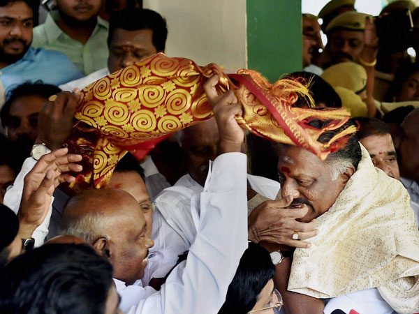 Tamil Nadu Chief Minister O Panneerselvam being greeted by AIADMK founding leader and former speaker of the state Assembly PH Pandian at his residence in Chennai. Tamil Nadu Chief Minister O Panneerselvam being greeted by AIADMK founding leader and former speaker of the state Assembly PH Pandian at his residence in Chennai.