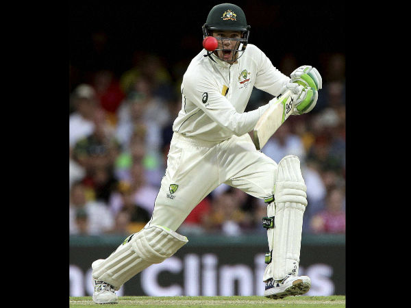 Australian batsman Peter Handscomb reacts as watches the ball during play Australian batsman Peter Handscomb reacts as watches the ball during play