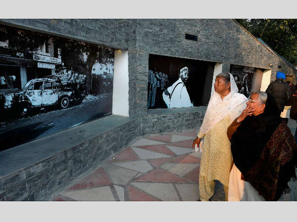 People get emotional during the inauguration of memorial for 1984 anti-Sikh riots named “The Wall of Truth” at premises of Gurdwara Rakab Ganj Sahib in New Delhi. PTI Photo by Shahbaz Khan. People get emotional during the inauguration of memorial for 1984 anti-Sikh riots named “The Wall of Truth” at premises of Gurdwara Rakab Ganj Sahib in New Delhi. PTI Photo by Shahbaz Khan.
