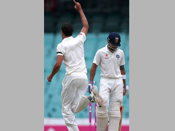 File photo: Virat Kohli (right) lowers his head after he lost his wicket to Mitchell Starc (left) File photo: Virat Kohli (right) lowers his head after he lost his wicket to Mitchell Starc (left)