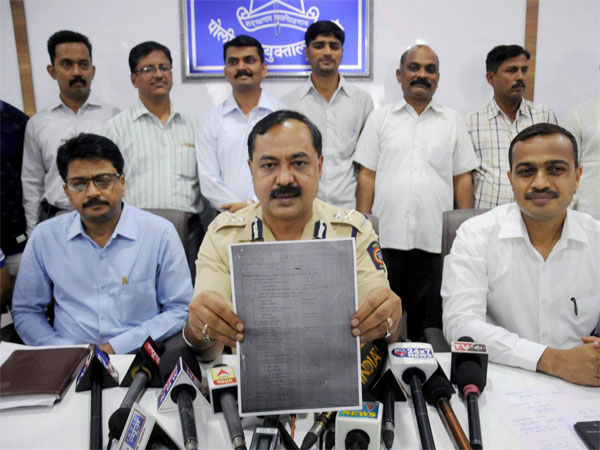 Thane Crime Branch officials show a examination paper of the Army Recruitment Board that was allegedly leaked, in Mumbai. The police has arrested 18 people from Maharashtra and Goa. Thane Crime Branch officials show a examination paper of the Army Recruitment Board that was allegedly leaked, in Mumbai. The police has arrested 18 people from Maharashtra and Goa.