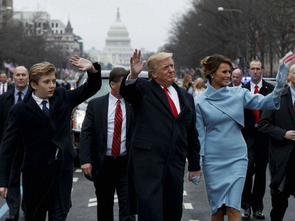 President Donald Trump and first lady Melania Trump walk along the Inauguration Day parade route after being sworn in as the 45th President of the United States, Friday, Jan. 20, 2017, in Washington. President Donald Trump and first lady Melania Trump walk along the Inauguration Day parade route after being sworn in as the 45th President of the United States, Friday, Jan. 20, 2017, in Washington.