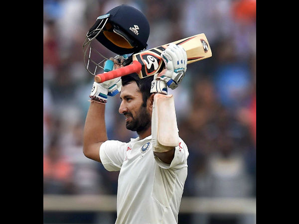 Pujara raises his bat