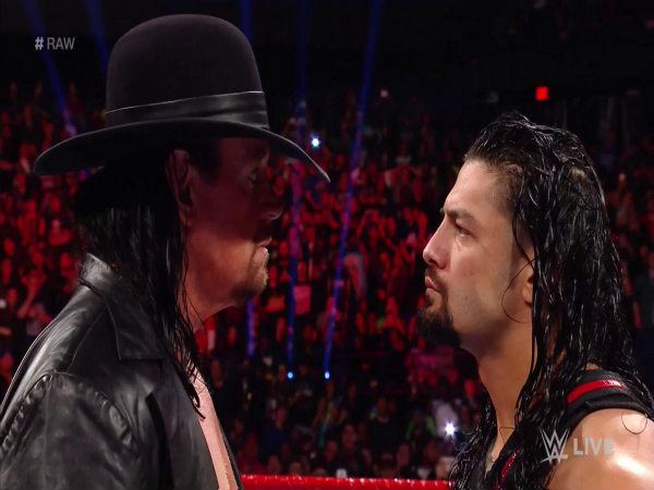 Undertaker (left) and Roman Reigns (Image courtesy:WWE Twitter) Undertaker (left) and Roman Reigns (Image courtesy:WWE Twitter)
