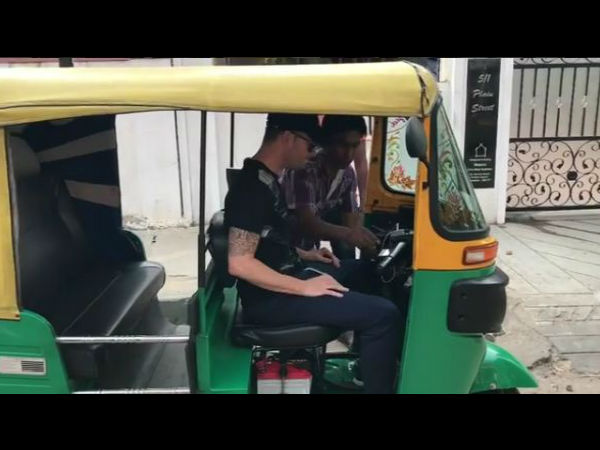 Michael Clarke drives auto rickshaw ahead of India-Australia Test in Bengaluru Michael Clarke drives auto rickshaw ahead of India-Australia Test in Bengaluru