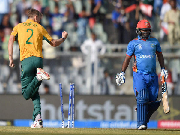 File photo: Chris Morris (left) ecstatic after dismissing Afghanistan's opener Mohammad Shahzad File photo: Chris Morris (left) ecstatic after dismissing Afghanistan's opener Mohammad Shahzad