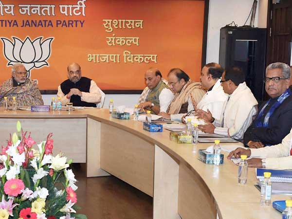Prime Minister Narendra Modi, BJP President Amit Shah, Home Minister Rajnath Singh and Finance Minister Arun Jaitley during the Central Election Committee meeting for Uttar Pradesh state elections at BJP headquarters in New Delhi. Prime Minister Narendra Modi, BJP President Amit Shah, Home Minister Rajnath Singh and Finance Minister Arun Jaitley during the Central Election Committee meeting for Uttar Pradesh state elections at BJP headquarters in New Delhi.