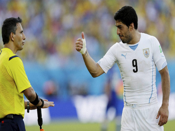 File photo: Mexican referee Marco Rodriguez (left) with Luis Suarez File photo: Mexican referee Marco Rodriguez (left) with Luis Suarez
