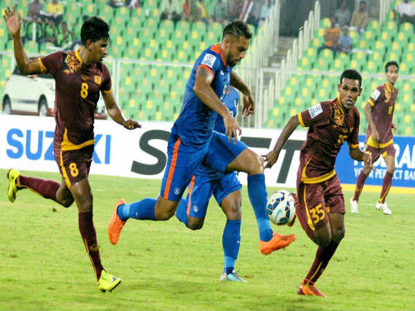 File photo: Robin Singh (centre) in action for India File photo: Robin Singh (centre) in action for India