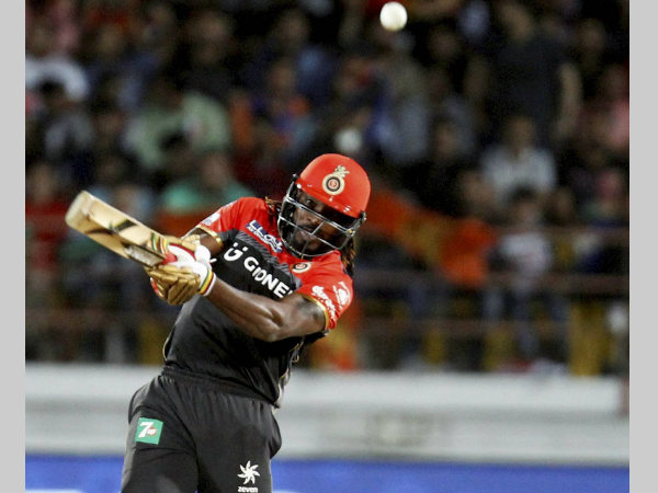 RCB's Chris Gayle plays a shot against GL RCB's Chris Gayle plays a shot against GL