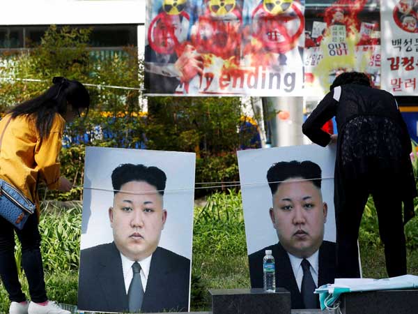 File photo of participants in Seoul setting the portraits of North Korean leader Kim Jong Un during a rally denouncing North Korea's nuclear test File photo of participants in Seoul setting the portraits of North Korean leader Kim Jong Un during a rally denouncing North Korea's nuclear test