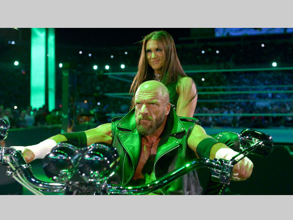 Triple H and Stephanie McMahon (back) (image courtesy WWE.com) Triple H and Stephanie McMahon (back) (image courtesy WWE.com)