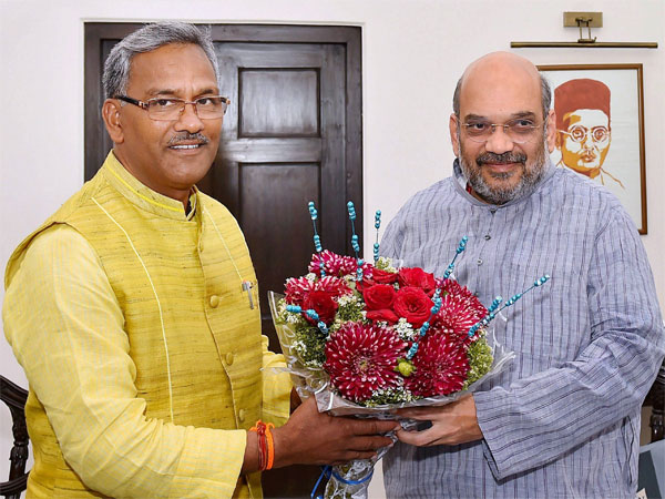 File photo of Uttarakhand Chief Minister Trivendra Singh Rawat (left) with BJP president Amit Shah at a meeting in New Delhi File photo of Uttarakhand Chief Minister Trivendra Singh Rawat (left) with BJP president Amit Shah at a meeting in New Delhi