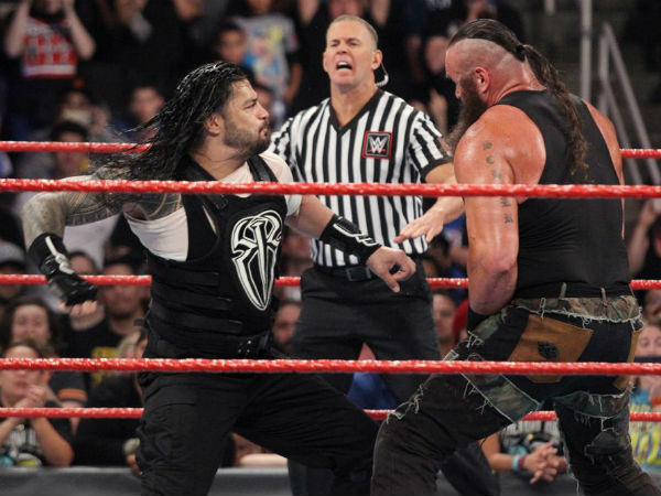 Roman Reigns (left) attacking Braun Strowman (image courtesy WWE.com) Roman Reigns (left) attacking Braun Strowman (image courtesy WWE.com)