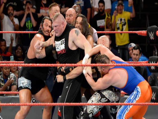 WWE Superstars stopping Brock Lesnar (centre) (Image courtesy: wwe.com) WWE Superstars stopping Brock Lesnar (centre) (Image courtesy: wwe.com)
