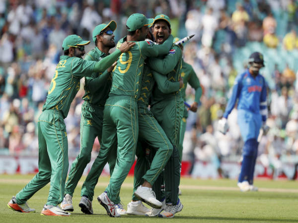 Pakistani players celebrate an Indian wicket Pakistani players celebrate an Indian wicket