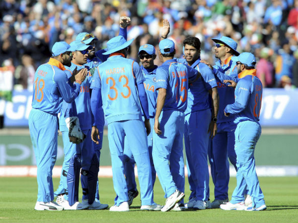 ndian cricketers celebrate the dismissal of Pakistan's Babar Azam by India's Umesh Yadav. ndian cricketers celebrate the dismissal of Pakistan's Babar Azam by India's Umesh Yadav.
