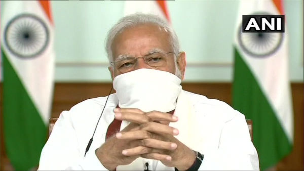 PM Modi dons home made face mask during virtual meeting with CMs
