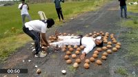Blindfolded martial arts master creates world record by smashing 49 coconuts in 1 minute