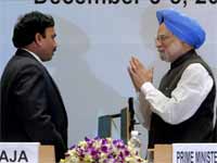 Prime Minister Manmohan Singh and former Telecom Minister A Raja