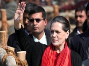 Gonda : Congress President Sonia Gandhi waves to crowd during an election rally.PTI