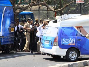 Lawyers attacking a media van