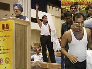 Protester goes shirtless in front of PM