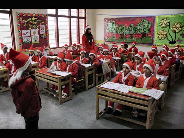 Christmas celebration: The Santas in school