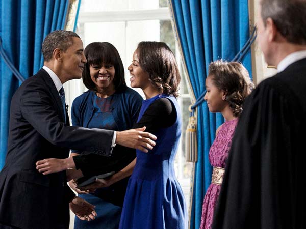 Barack Obama embraces daughter Malia