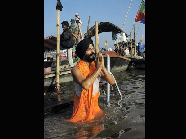 MS Bitta offering prayers after taking bath