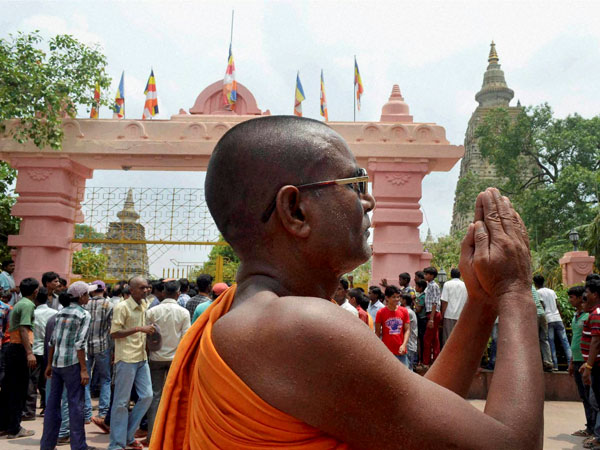 A Buddhist Monk worshiping