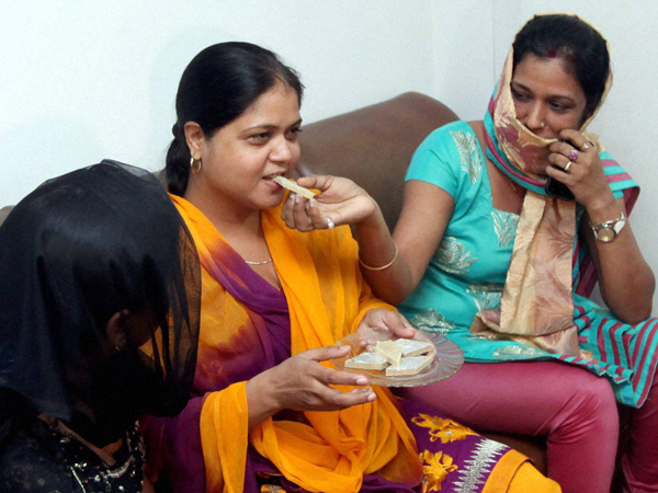 Bar girls celebrate with sweets