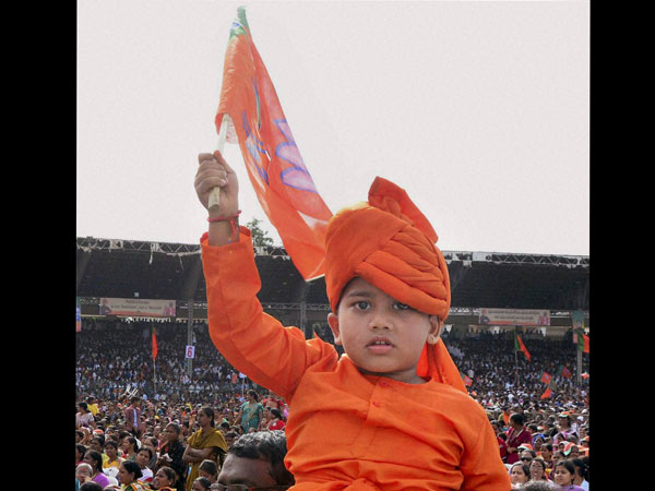 A kid dressed as Swami Vivekananda