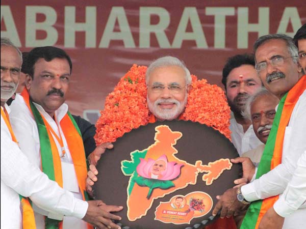 Leaders felicitate Modi